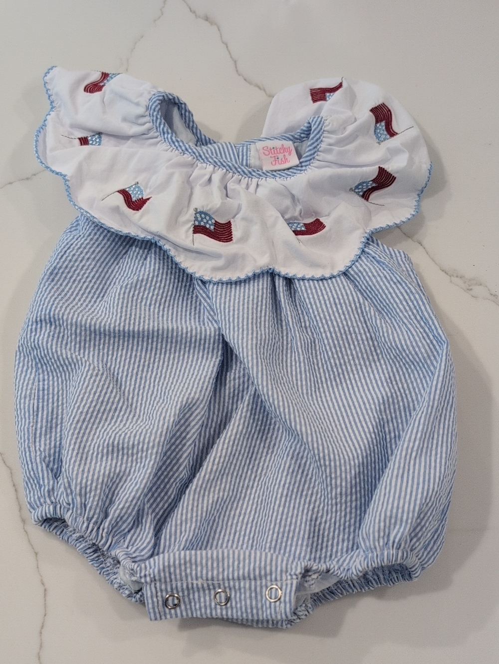 Stitchy Fish Blue Stripe Baby Romper with Ruffle Flag Trim 0-3M